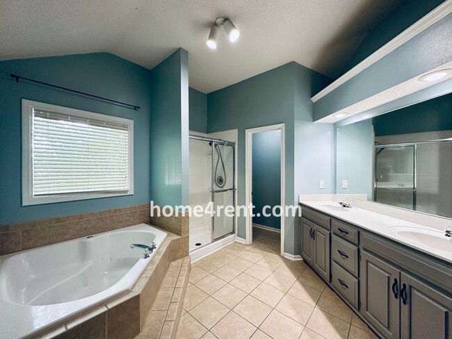 Building Photo - Blue Valley Schools w/ Wood Floors, Finished Basement and a Peaceful, Private Fenced Yard!