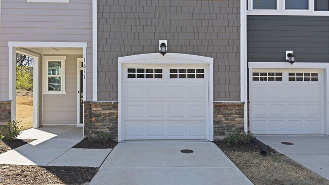 Building Photo - Upgraded 3BR Townhome in Wake Forest | Open Layout, Garage & Resort-Style Amenities