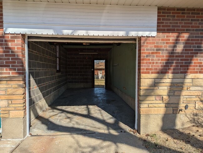 Building Photo - Fully Renovated Home with Sunroom, Garage & Huge Fenced Yard