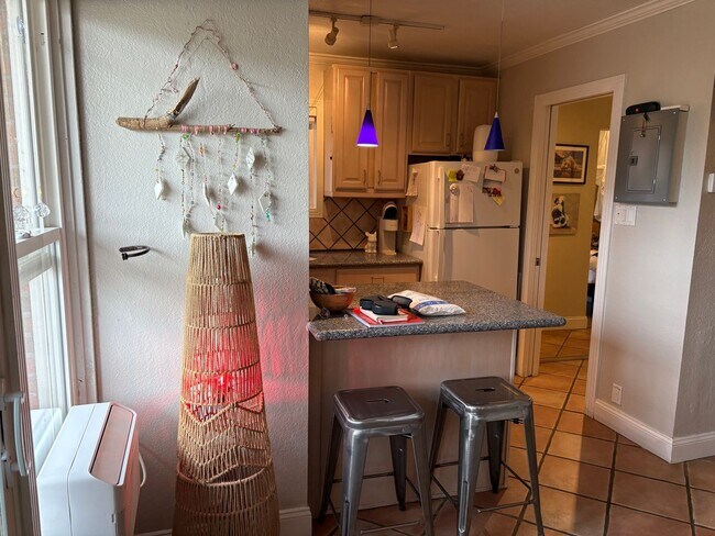 Building Photo - One Bedroom Condo Walking Distance to CU with Fenced Backyard and Flatiron Views!