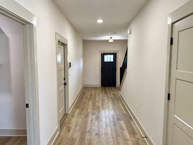Building Photo - Need Space?  How about 5 bedrooms, 2.5 baths + an extra bonus area upstairs so that the kids can ...