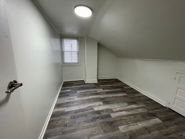 The second bedroom offers a tree lined street view - 212 Lorenz Ave