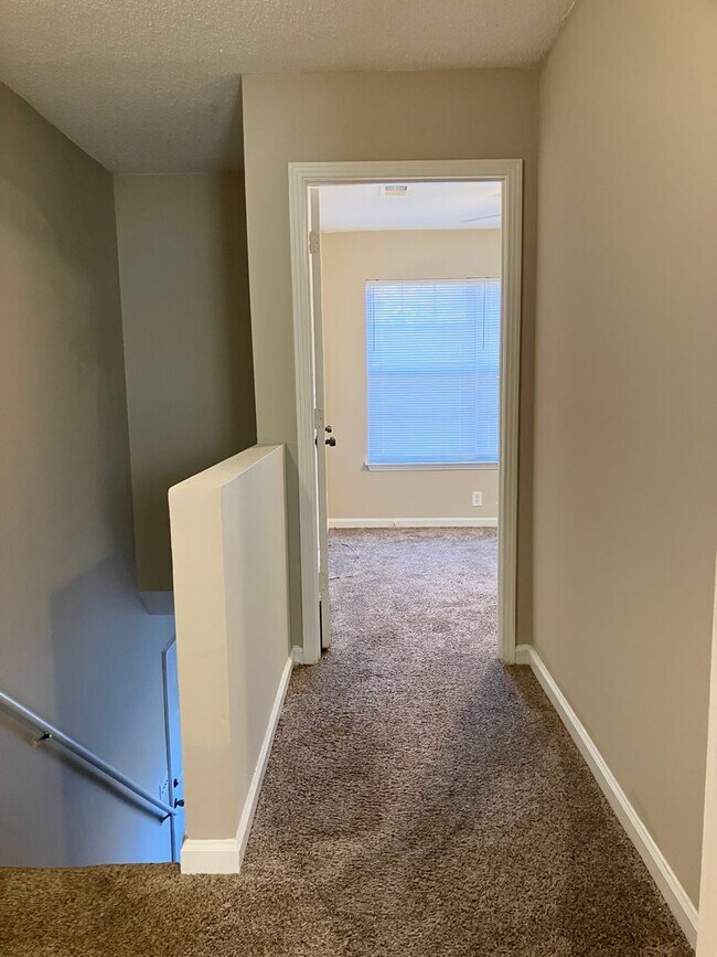 Building Photo - 2 story end unit condo