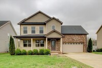 Building Photo - Stunning Home With Covered Front Porch, Fi...