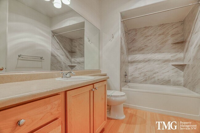 Building Photo - Spacious Ground-Level 2BD Condo with Garage & Resort-Style Amenities