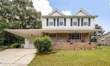 Building Photo - 4 bed & 2.5 bath with a pool