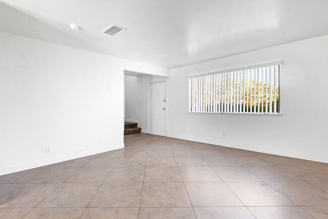 Building Photo - Spacious 3-Bed, 1.5-Bath Townhome with Oversized Private Patio in Central 89103 — Bright Bedrooms...
