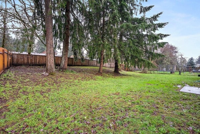 Building Photo - Light & Airy 2-Bedroom Olympia Home with Private Baths & Spacious Backyard!