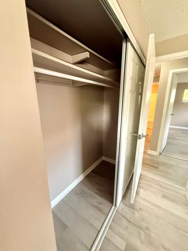 Building Photo - Move-In Ready 2BR with Stunning Granite + Fenced Backyard