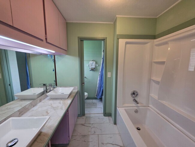 Building Photo - Available July 1 | Flexible 5-Bedroom Layout | 3.5BA Home | Secured Carport