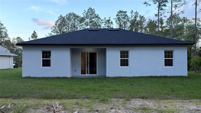 Building Photo - 7250 N Freeport Cir