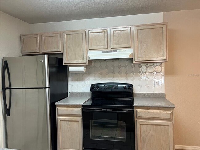 Building Photo - 8915 Latrec Ave