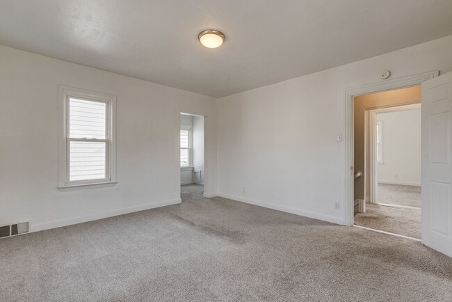 Building Photo - AVAILABLE JULY 2026 - Spacious 2 Bedroom Home w/ Fenced Yard & AC!