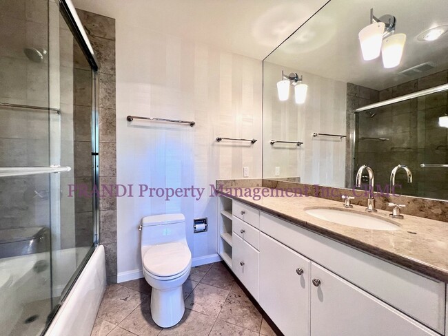 Building Photo - Split Level Condo Just Steps from Downtown