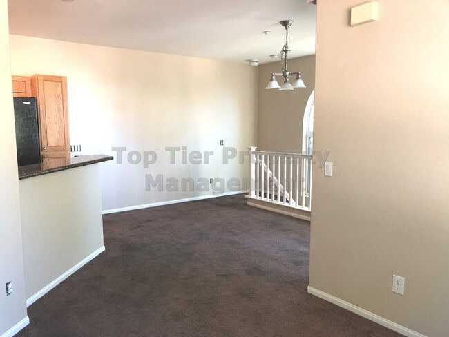 Building Photo - **Gated 3 bed, 3 bath Townhome with 2-Car ...