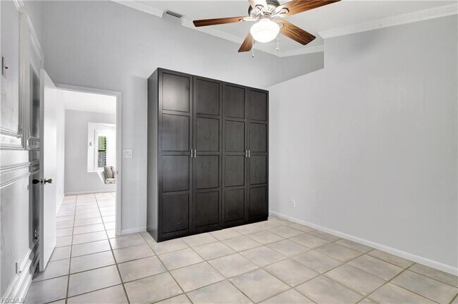 Building Photo - 42nd Terrace Southwest, Naples, FL 34116 -...