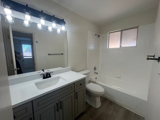 Building Photo - GORGEOUSLY REMODELED 2 bed 2 bath on 3rd floor with vaulted ceiling and skylight and in unit W/D!!