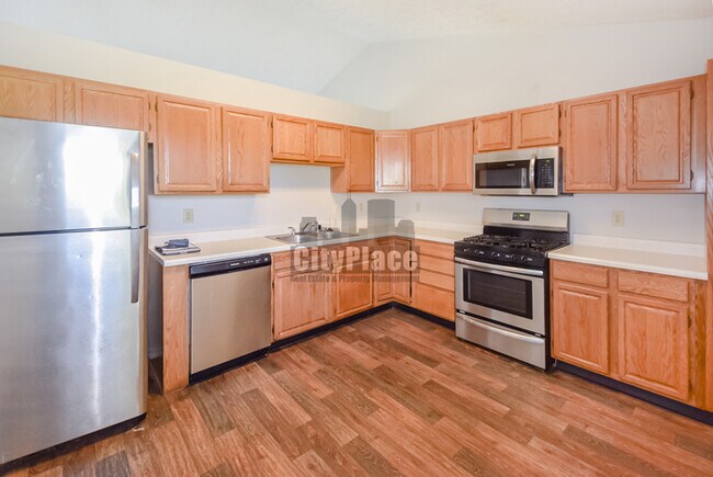 Building Photo - 6830 Medallion Dr
