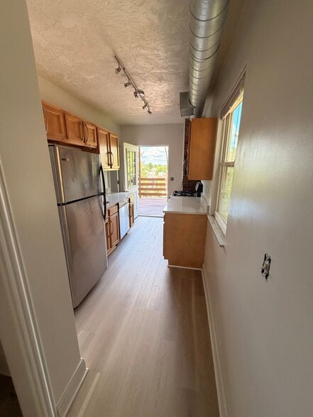 Kitchen to deck - 128 Cohassett St