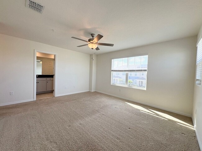 Building Photo - Newly Built, Water View, Luxury Executive 3 BR Lake Nona area corner townhome with an exclusive l...