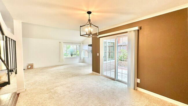 Building Photo - Spacious Two-Story Home with Three-Car Att...