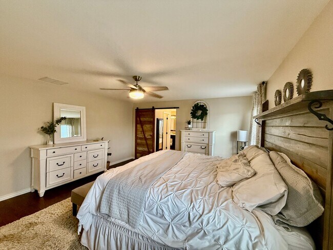 Building Photo - Spacious & Stylish 5-Bedroom Home in Wolf ...