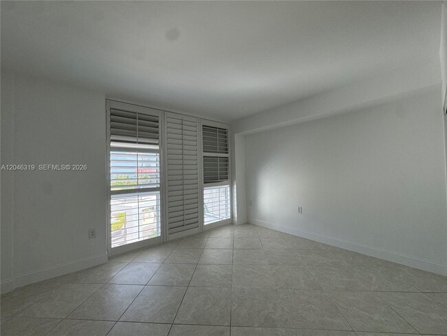 Building Photo - 10275 Collins Ave