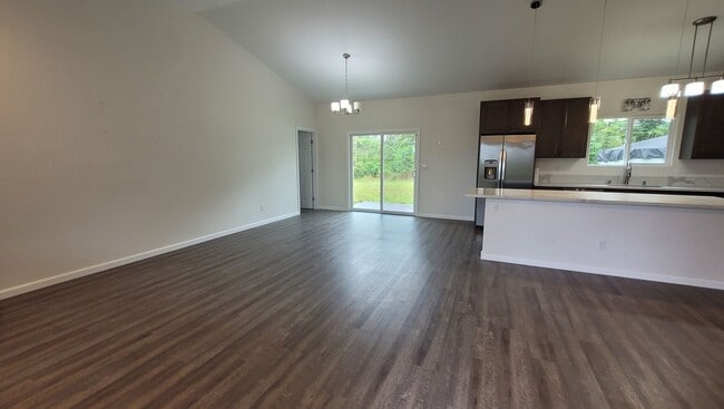 Building Photo - This 3-bedroom, 2-bath home in Orchidland Subdivision