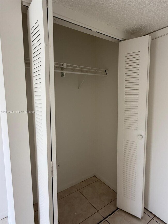 Building Photo - 8550 N Sherman Cir