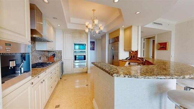 Building Photo - 10295 Collins Ave