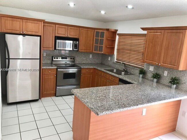 Building Photo - 5758 NW 97th Pl
