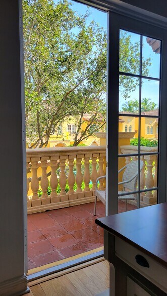 2nd floor office area balcony overlooking pool - 345 NE 69th Cir