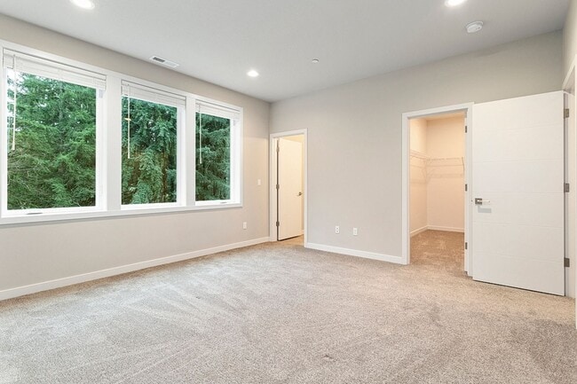 Building Photo - 2022 Build -Almost Brand New 3 br 2.5 bth Home with hardwoods, fenced yard and backs to greenspace !