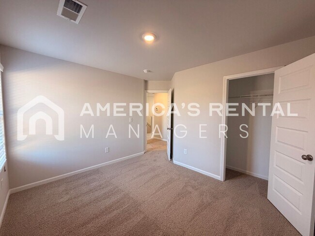 Building Photo - Spacious Two-Story Townhome with Open Layout!
