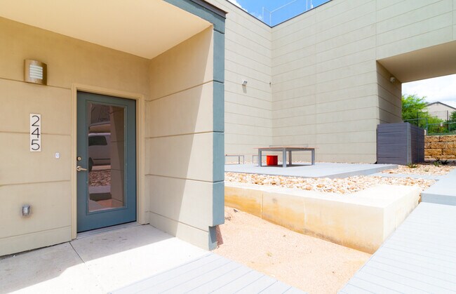 Building Photo - Stunning 2/2.5 multi-level Skybridge Lofts...