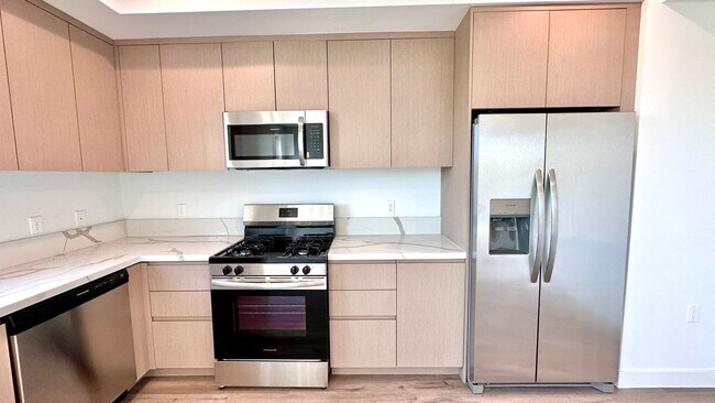Building Photo - Affordable 1-Bedroom Top Floor Unit with M...