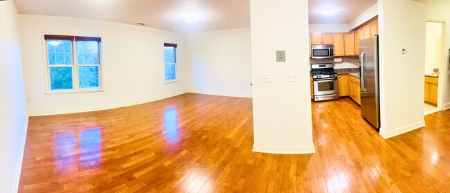 3D view of the living area, kitchen and half bath - 391 Pleasant St
