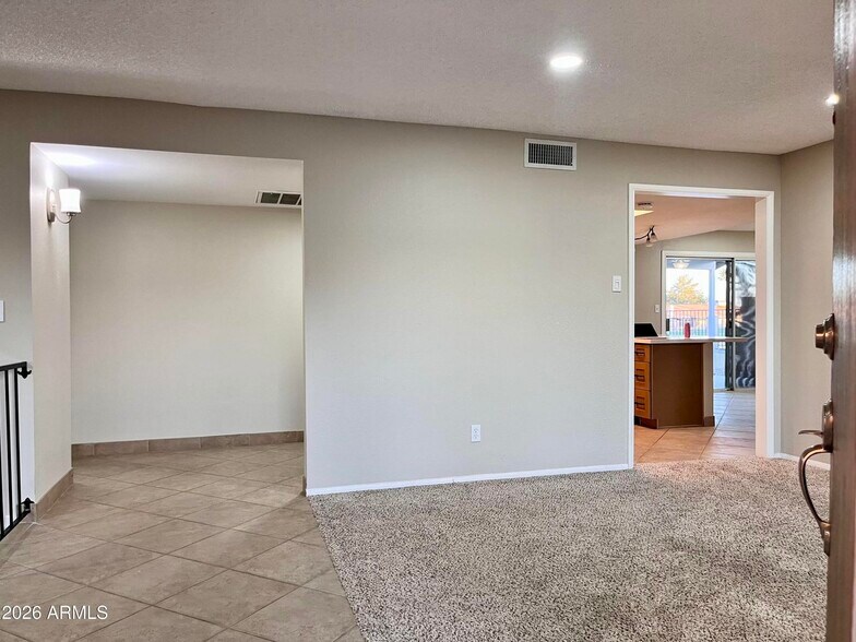 Entrance into hallway and kitchen areas - 11625 S Mohave St