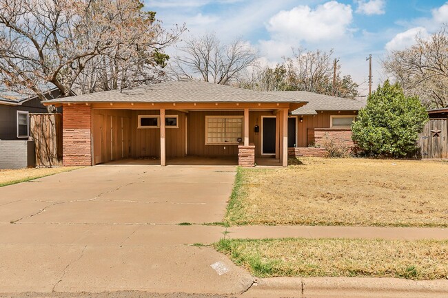 Building Photo - Cute midcentury modern home in central Lub...