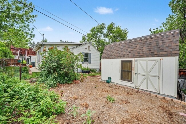 Building Photo - Charming Golden Retreat with a Backyard Oasis, Garden Dreams & Bonus Loft Office!