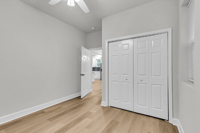 Building Photo - Cute all brick ranch on a large corner lot with fenced in yard and 1 car garage