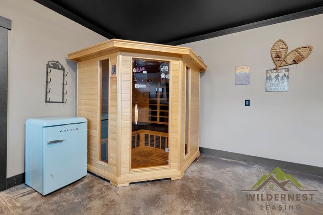 Building Photo - Beautiful Furnished Townhome with infared sauna, finished garage and community amenties