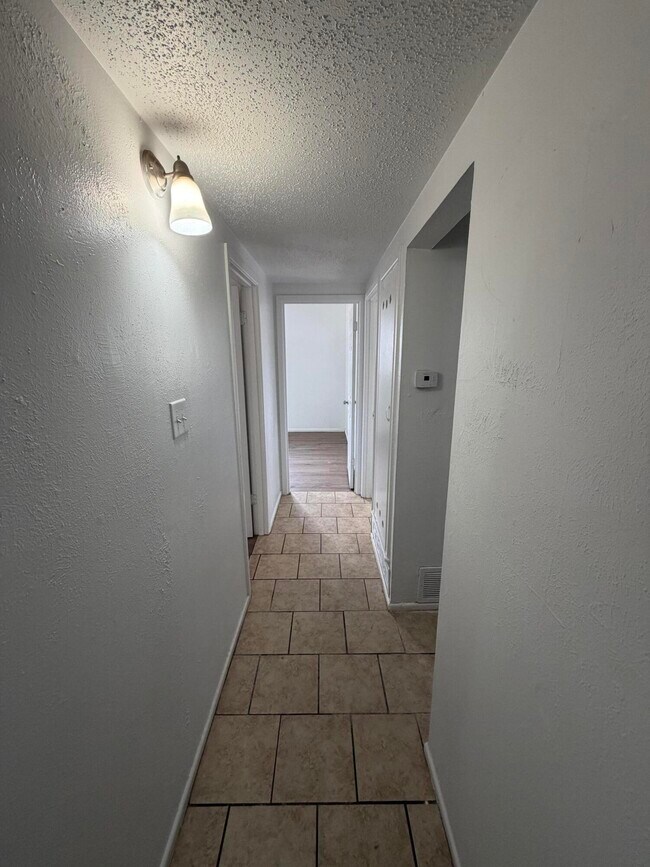 Building Photo - 6004 Peoria Ave