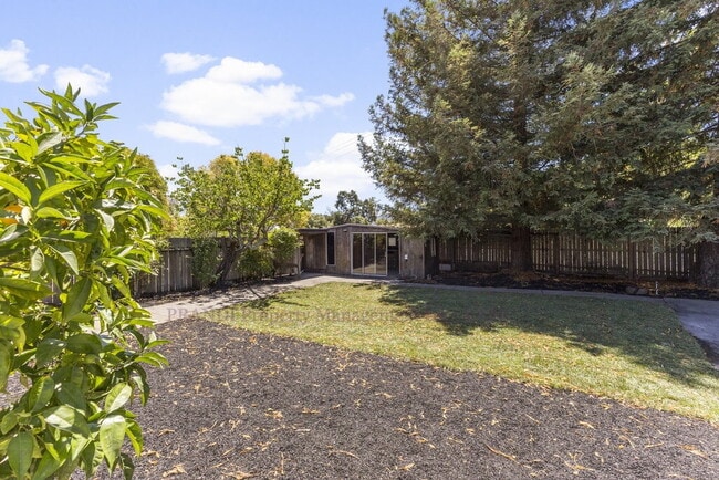Building Photo - Central Novato Home with Large Yard and A/C!