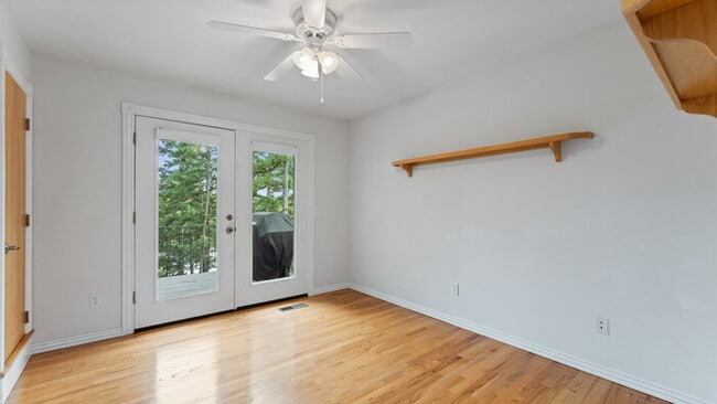 Building Photo - Serene Bella Vista Lakeside 4 bedroom