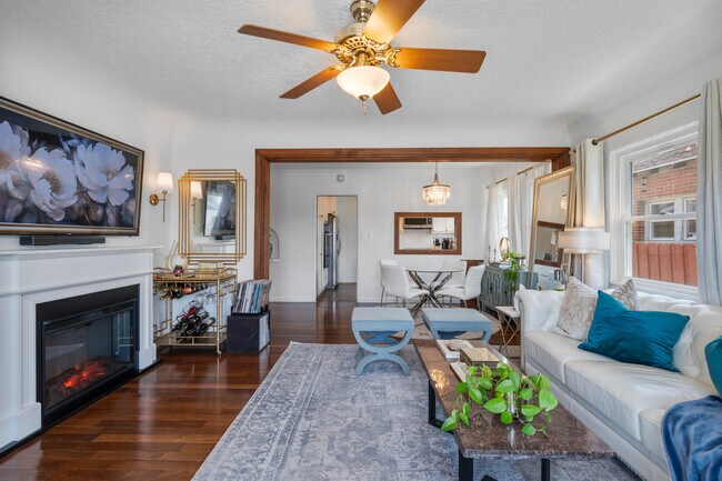 Open concept living and dining room area. - 1150 W 25th St