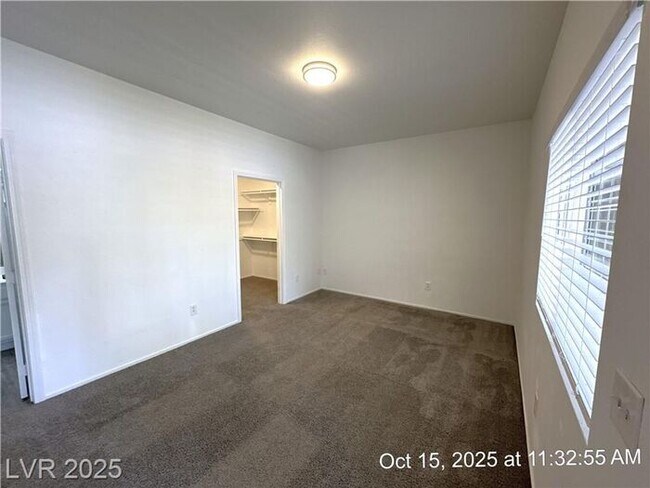 Building Photo - SPACIOUS FIRST-FLOOR CONDO LOCATED IN A GA...