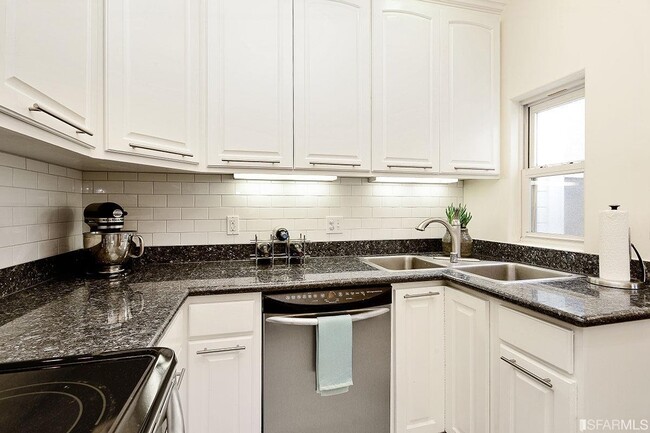 updated kitchen with all the amenities - 1800 Turk St