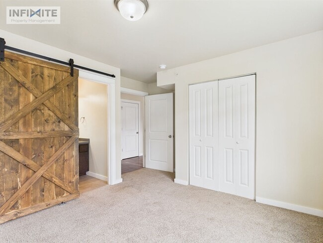 Building Photo - Cute As A Button 2 Bedroom Condo on Baxter Lane!