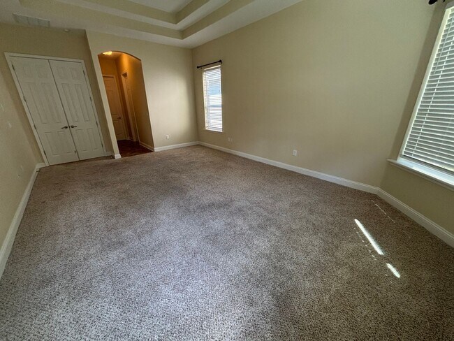 Building Photo - Spacious 4BR/3BA Home with 3-Car Garage, Bonus Office & Covered Patio in St Johns!